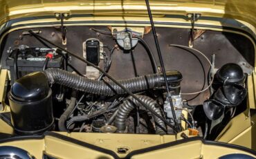 Willys-Jeepster-1950-YellowWhite-Black-19