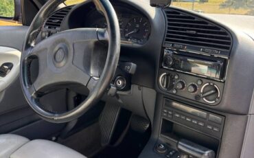 Bmw-325ci-1995-purple-8
