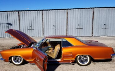 Buick-Riviera-coupe-1964-Orange-Tan-22