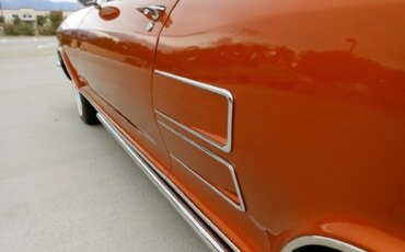 Buick-Riviera-coupe-1964-Orange-Tan-8