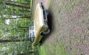 Buick-Riviera-gran-sport-1969-Gold-Black-1