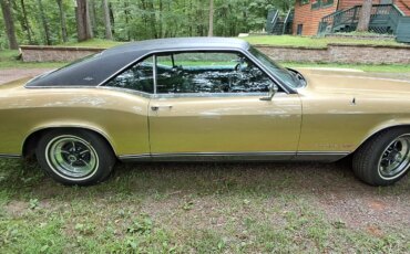 Buick-Riviera-gran-sport-1969-Gold-Black-3