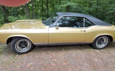 Buick-Riviera-gran-sport-1969-Gold-Black-4