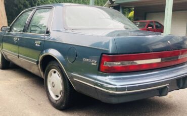 Buick-century-1994-green-7
