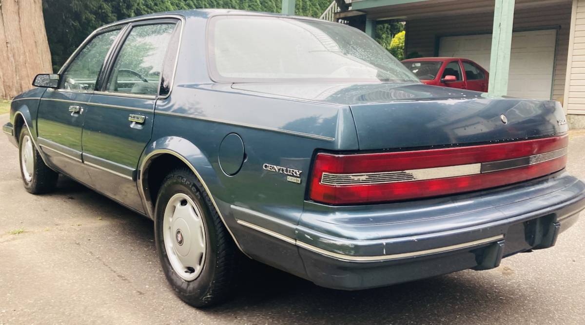 Buick-century-1994-green-7