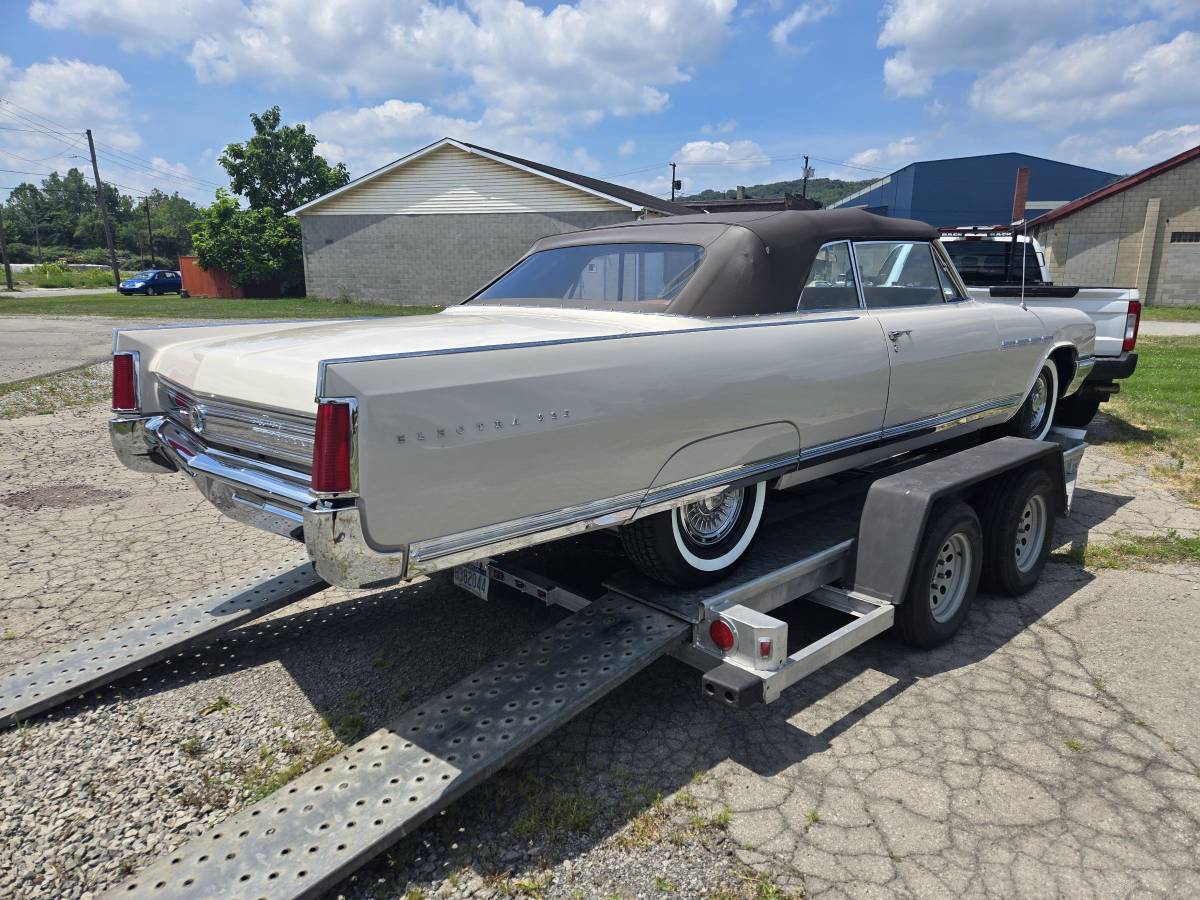 Buick-lacrosse-1964-white-4