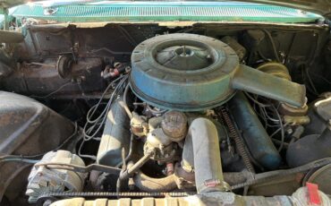 Cadillac-2-dr-coupe-1960-Blue-White-15