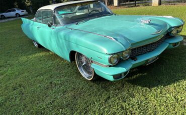 Cadillac-2-dr-coupe-1960-Blue-White-5