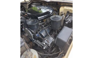 Cadillac-Coupe-deville-1957-40-Leghorn-Creme-Brown-34