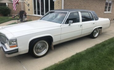 Cadillac-De-ville-sedan-1984-White-Blue