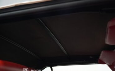 Cadillac-Eldorado-1976-Cotillion-White-Firethorn-Red-47