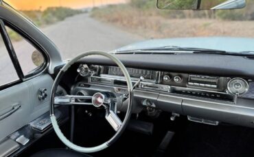Cadillac-coupe-1961-82