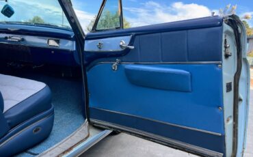 Cadillac-coupe-deville-1952-blue-10