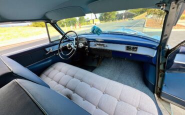 Cadillac-coupe-deville-1952-blue-11