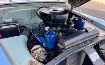 Cadillac-coupe-deville-1952-blue-16