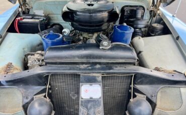 Cadillac-coupe-deville-1952-blue-17