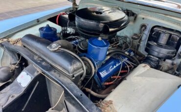 Cadillac-coupe-deville-1952-blue-18