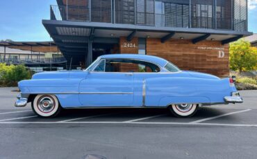 Cadillac-coupe-deville-1952-blue-7