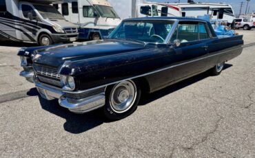 Cadillac-coupe-deville-1964-5