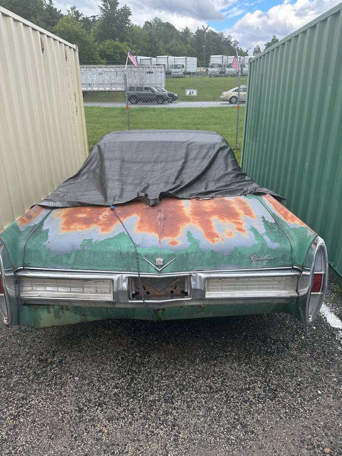 Cadillac-coupe-deville-1967-green-2