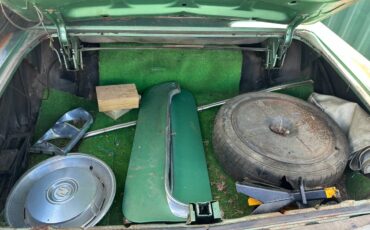Cadillac-coupe-deville-1967-green-7