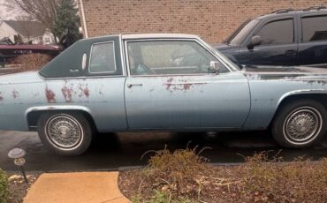 Cadillac-coupe-deville-1977-blue-1