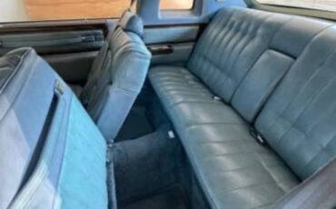 Cadillac-coupe-deville-1977-blue-2