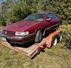 Cadillac-coupe-deville-1993-red