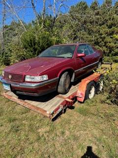 Cadillac-coupe-deville-1993-red