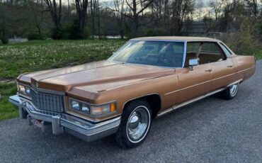 Cadillac-deville-1976-orange