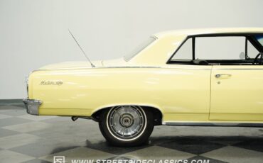 Chevrolet-Chevelle-1964-Butternut-Yellow-Black-31