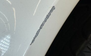 Chevrolet-Corvette-1973-Classic-White-Medium-Saddle-11
