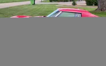 Chevrolet-Corvette-coupe-1975-Red-Tan-4