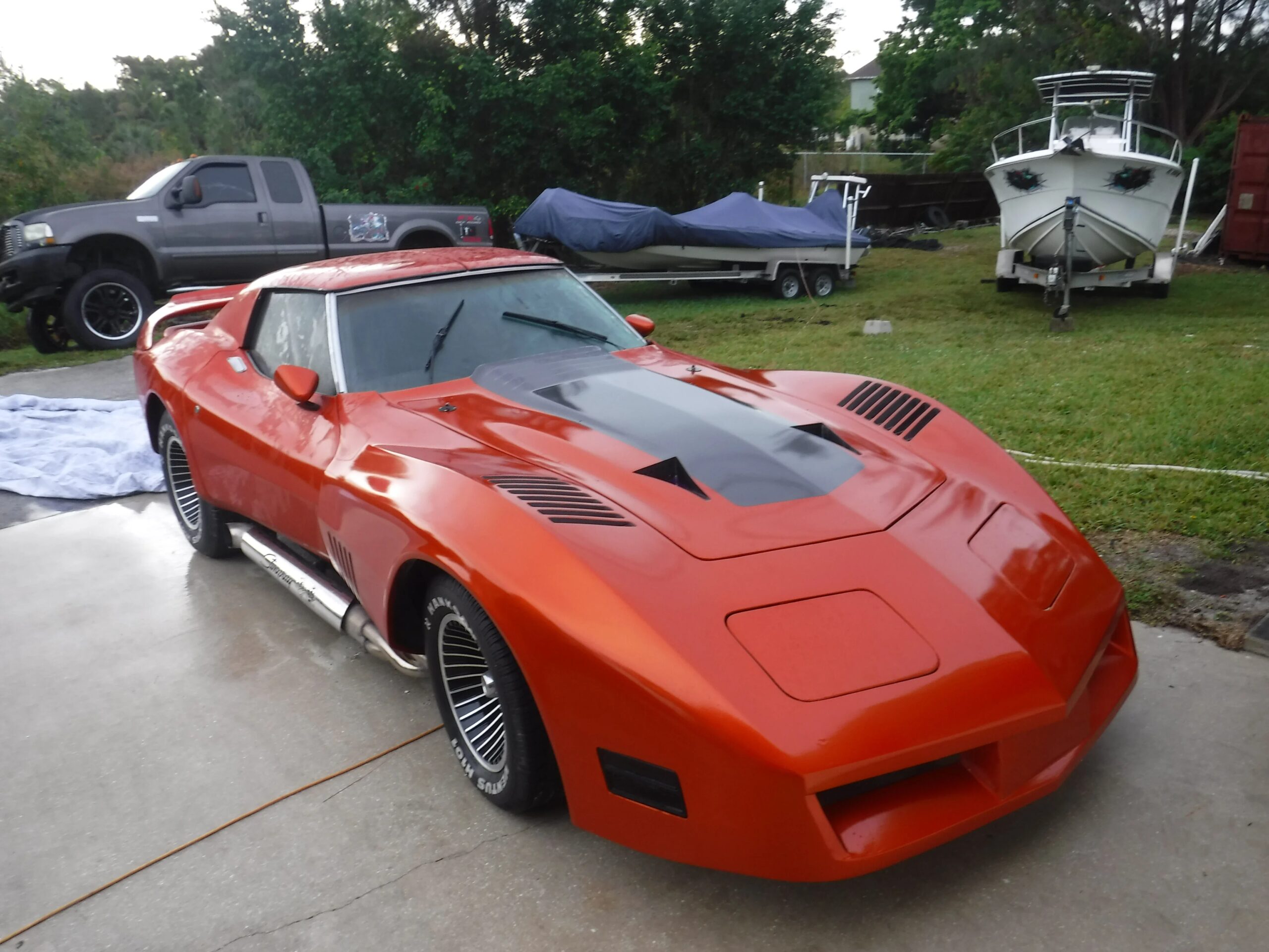 Chevrolet-Corvette-stingray-1976-Orange-Black-16