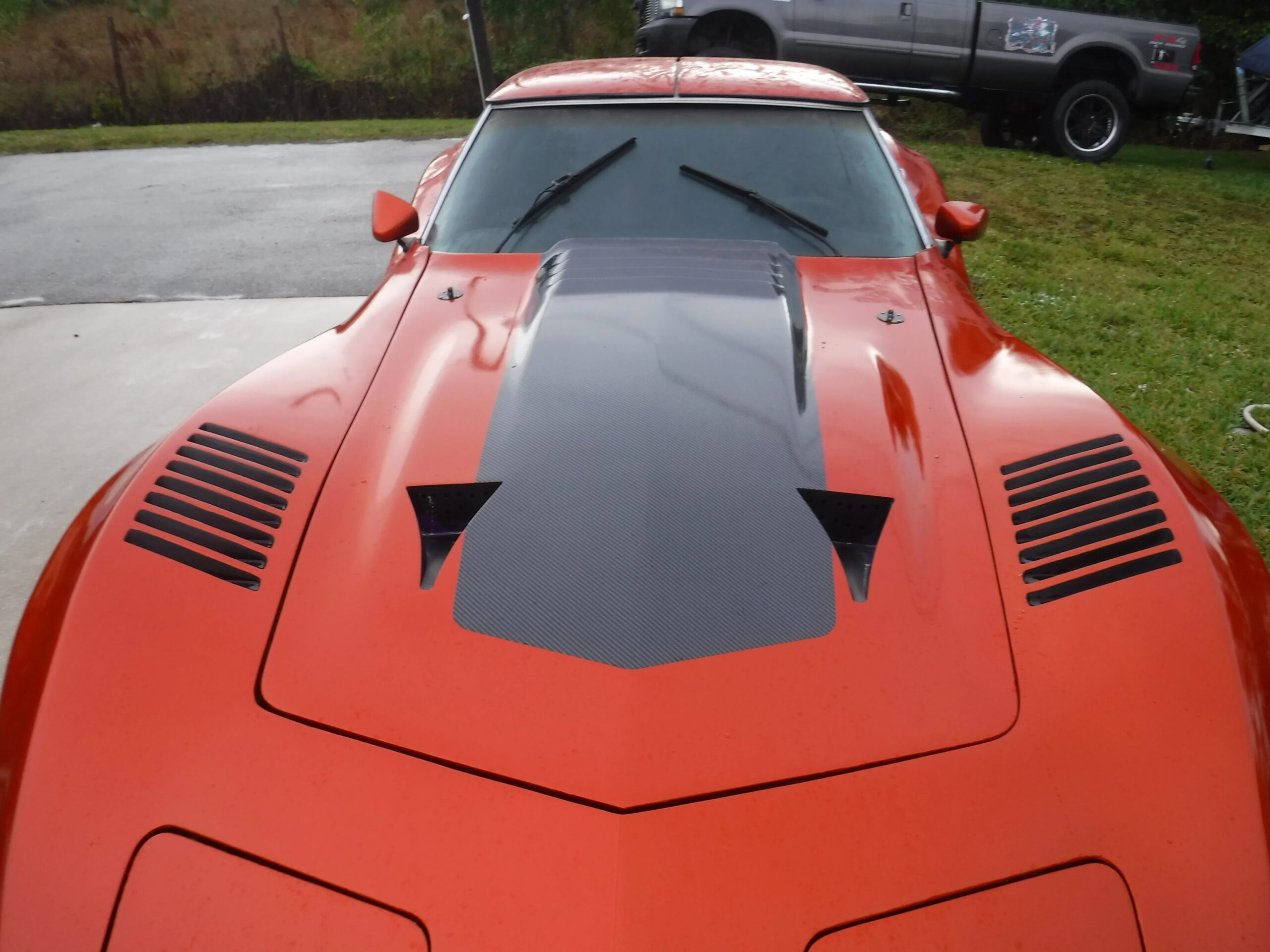 Chevrolet-Corvette-stingray-1976-Orange-Black-2