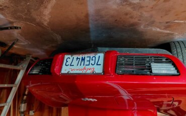 Chevrolet-Corvette-stingray-1977-Red-Tan-6