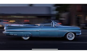 Chevrolet-Impala-1959-turquoisewhite-aqua-teal-lt.-blue-44