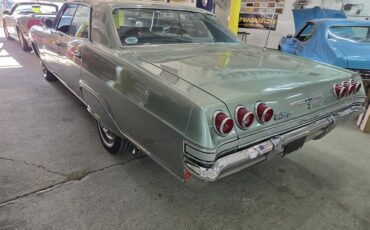Chevrolet-Impala-1965-green-black-7