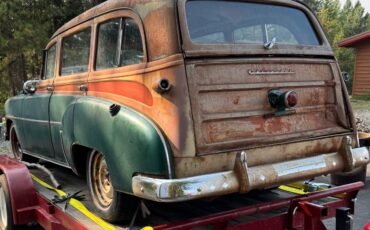 Chevrolet-deluxe-tin-woody-station-wagon-1952-green-2