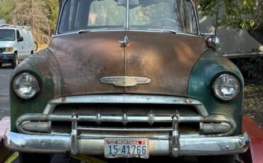 Chevrolet-deluxe-tin-woody-station-wagon-1952-green