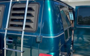 Chevy-g-20-series-conversion-van-1994-green-8