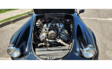 Daimler-Sp250-1963-Black-Red-3