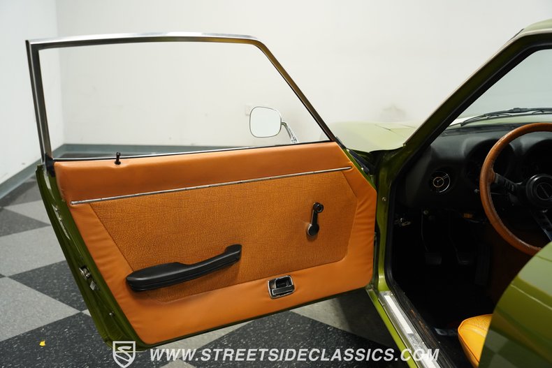 Datsun-240z-1972-Green-Metallic-Tan-34
