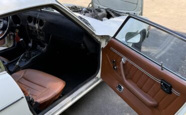 Datsun-280z-1977-White-Brown-black-11