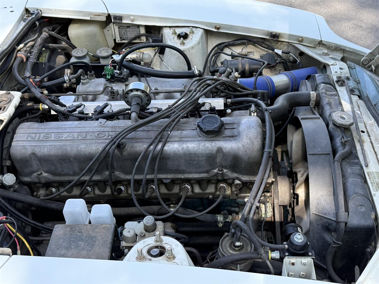Datsun-280z-1977-White-Brown-black-16