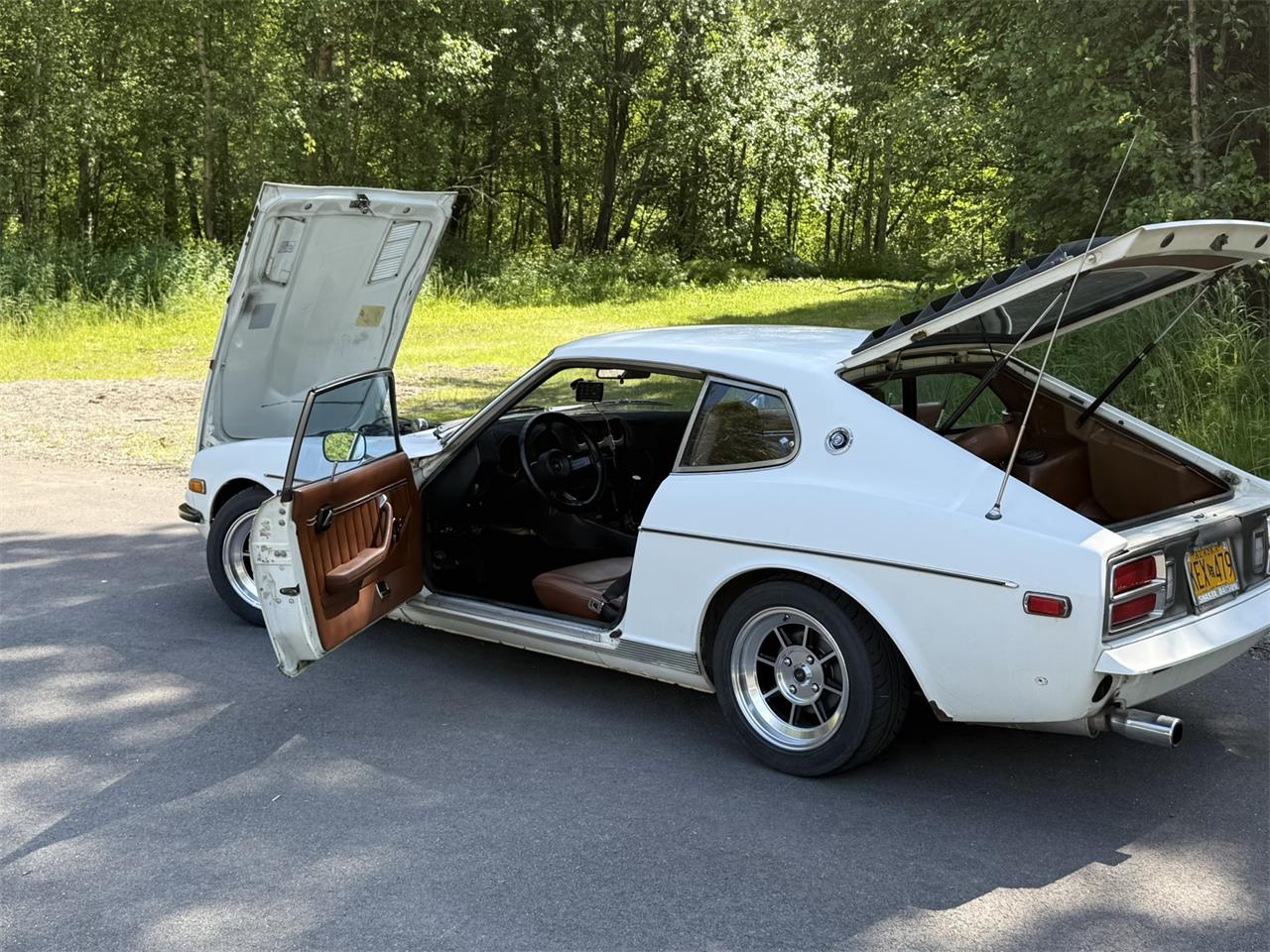 Datsun-280z-1977-White-Brown-black-7
