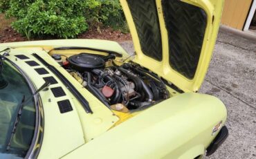 Fiat-124-spider-1976-yellow-17