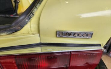 Fiat-124-spider-1976-yellow-7