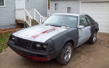 Ford-Mustang-gt-hatchback-1984-Yellow-Black-16