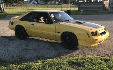 Ford-Mustang-gt-hatchback-1984-Yellow-Black-6